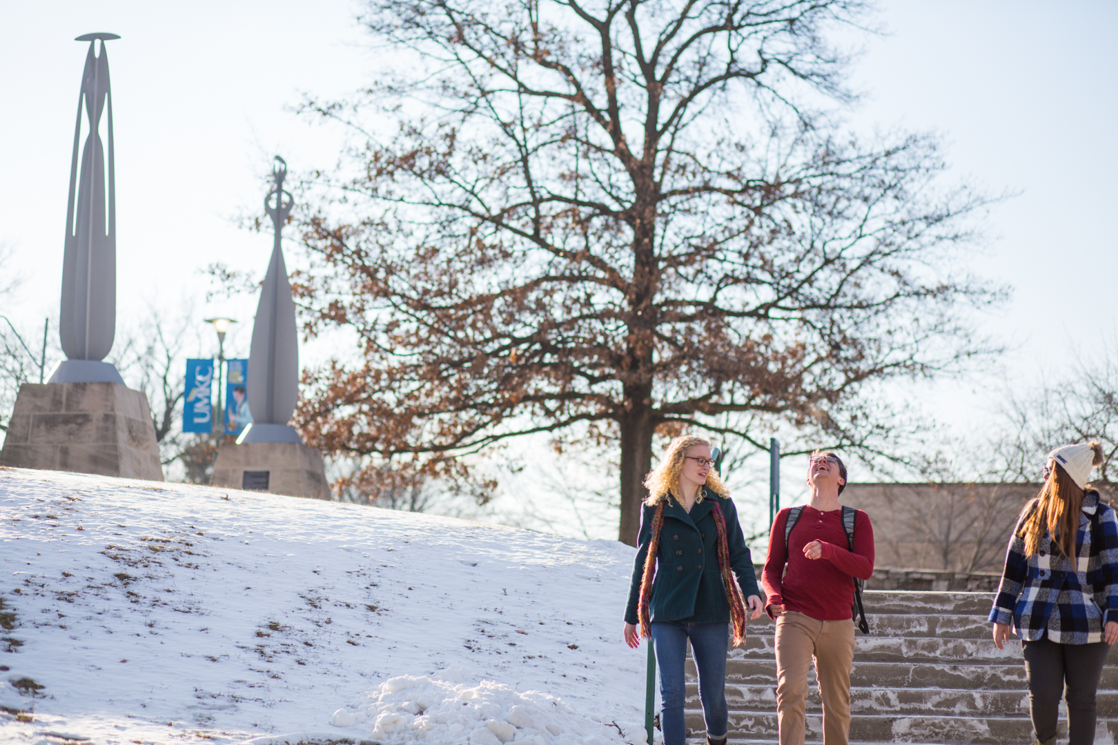 students on campus in the snow