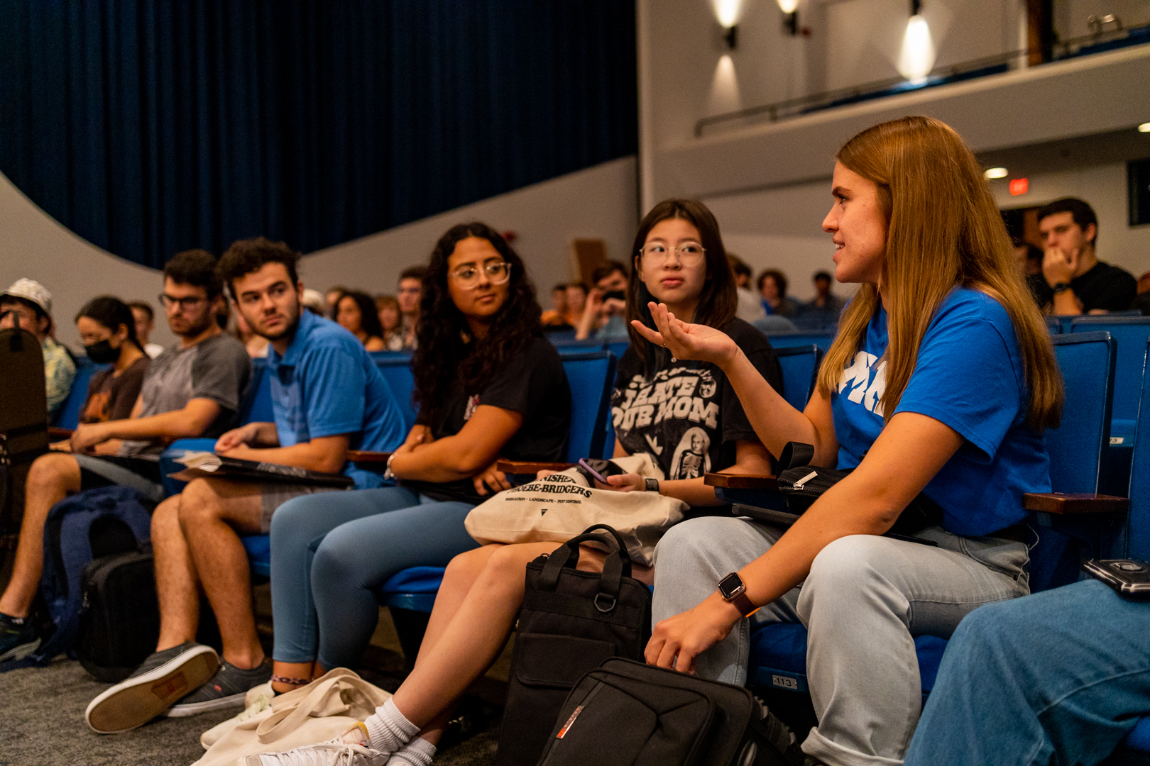 Row of students during welcome week in auditorium