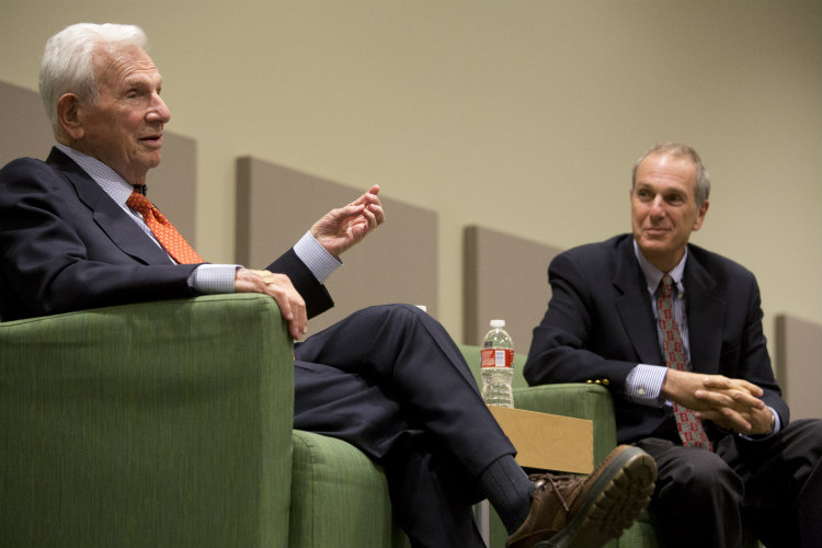 Henry Bloch, in conversation with his son, Tom Bloch, at the Bloch School of Management