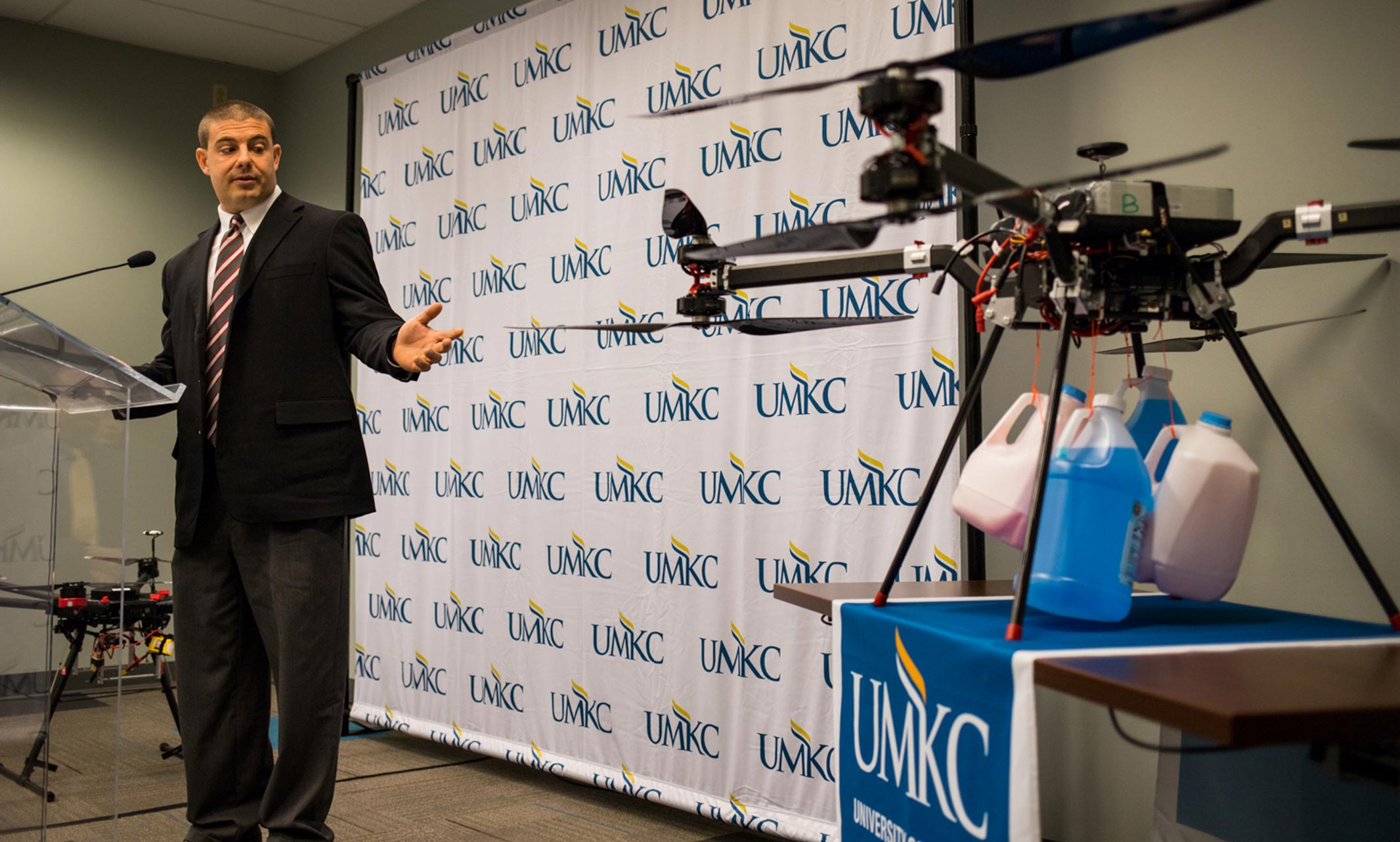 Tony Caruso, UMKC associate vice chancellor presenting research and models of drones