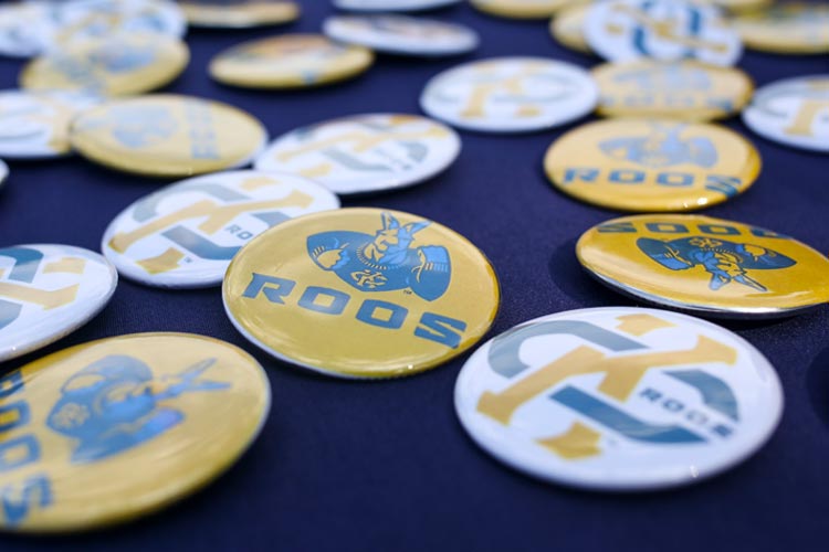table of buttons featuring the new KC Roo athletics logo
