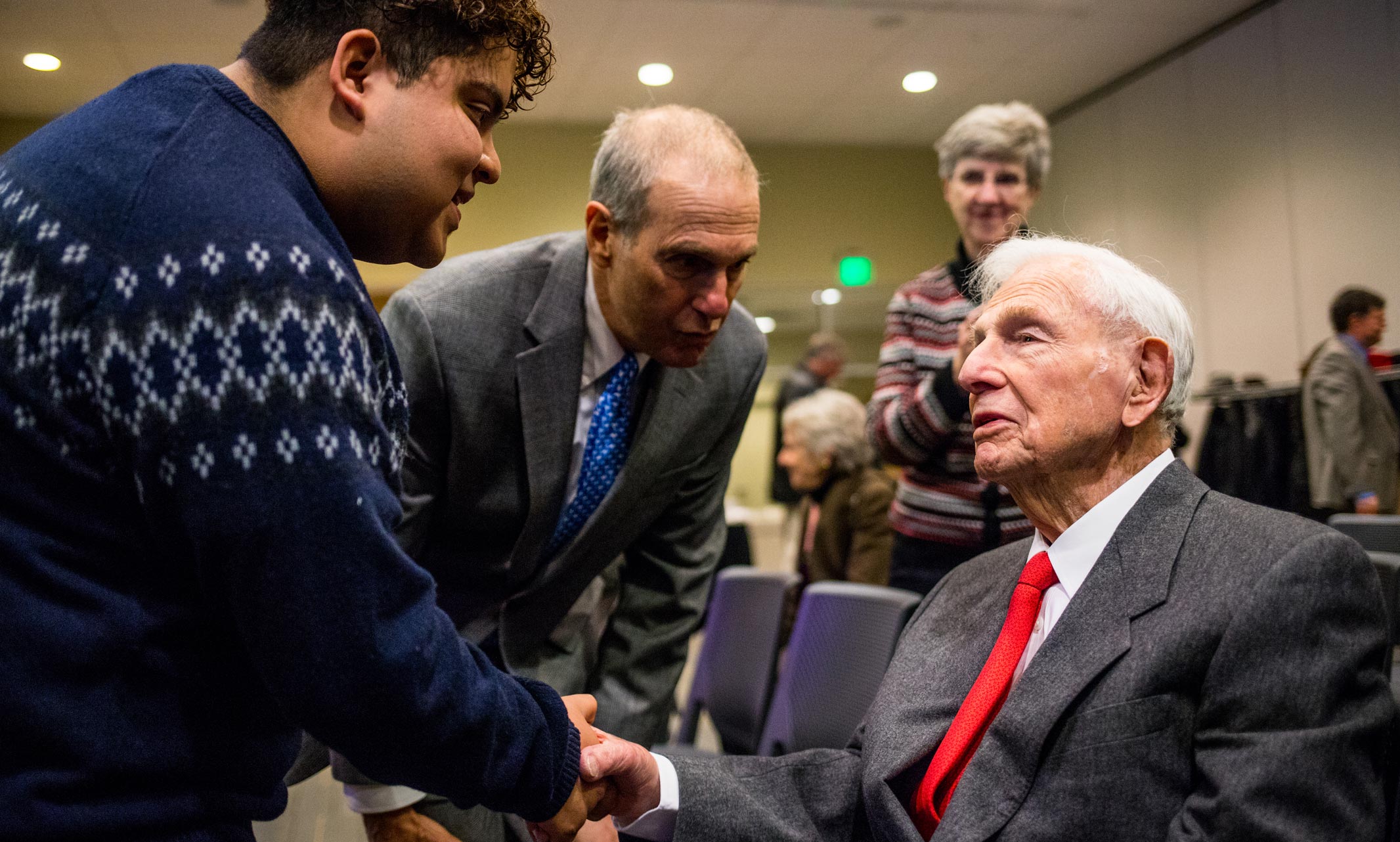 UMKC student Brian Ramirez greets Henry Bloch at the scholarship announcement event