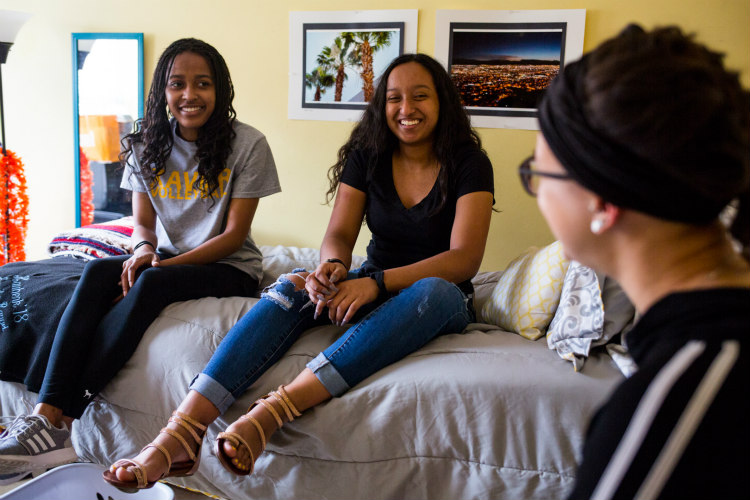 Jennifer Rangel in dorm room with two other UMKC students.