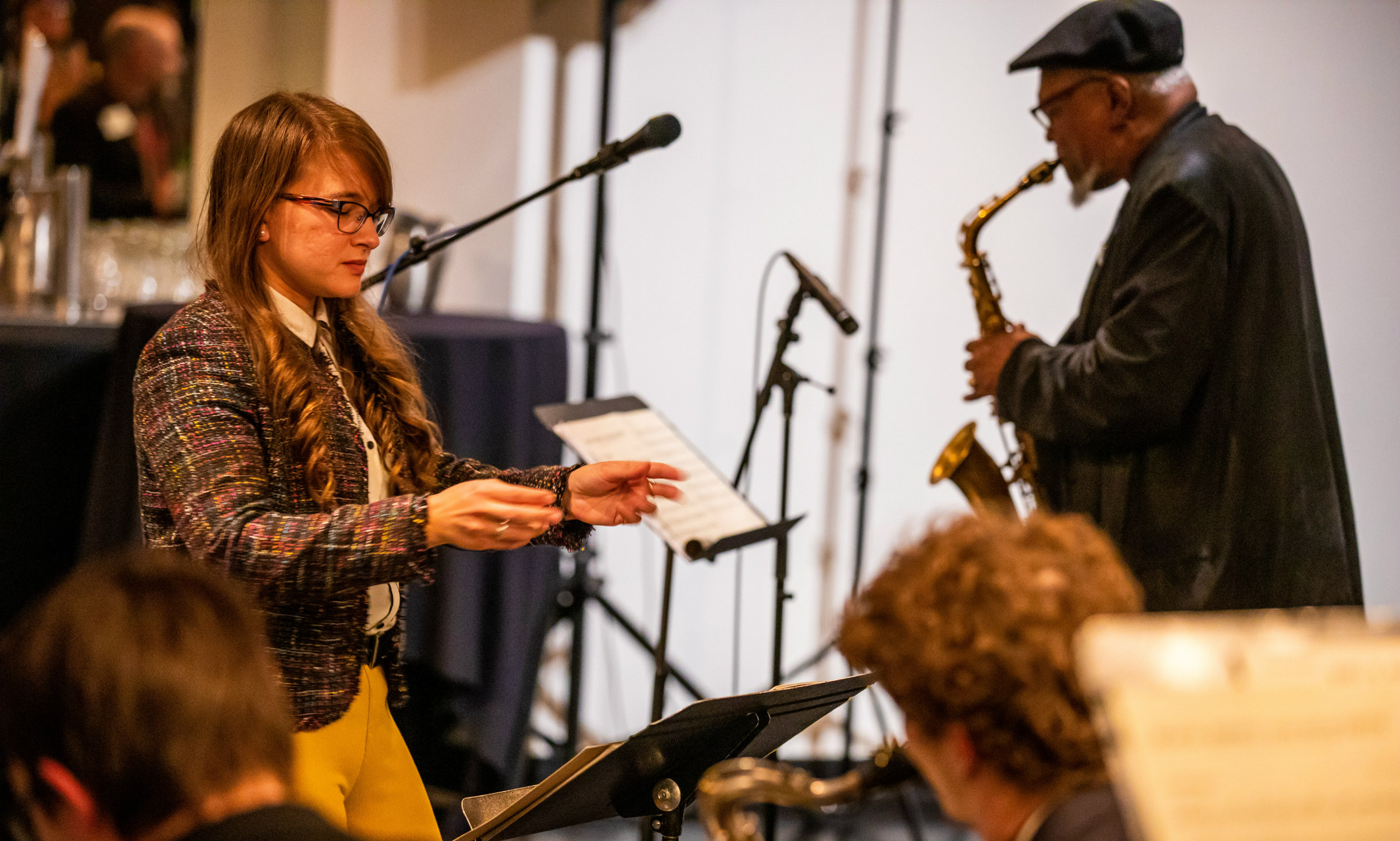 Aryana Nemati-Baghestani conducting a jazz band during Bobby Watson's tribute party in February 2020.