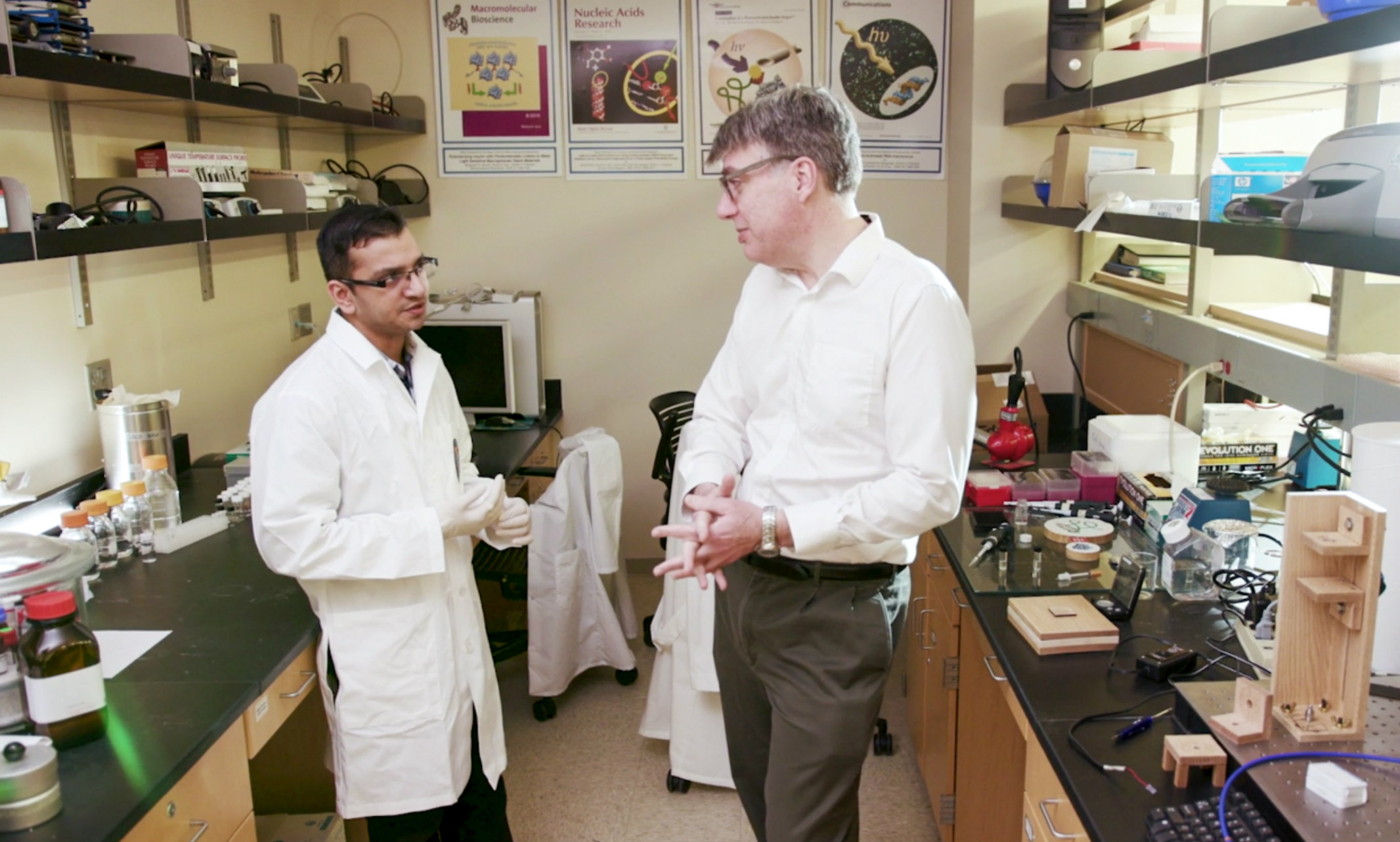 Simon Friedman, at right, with one of the researchers on his team.