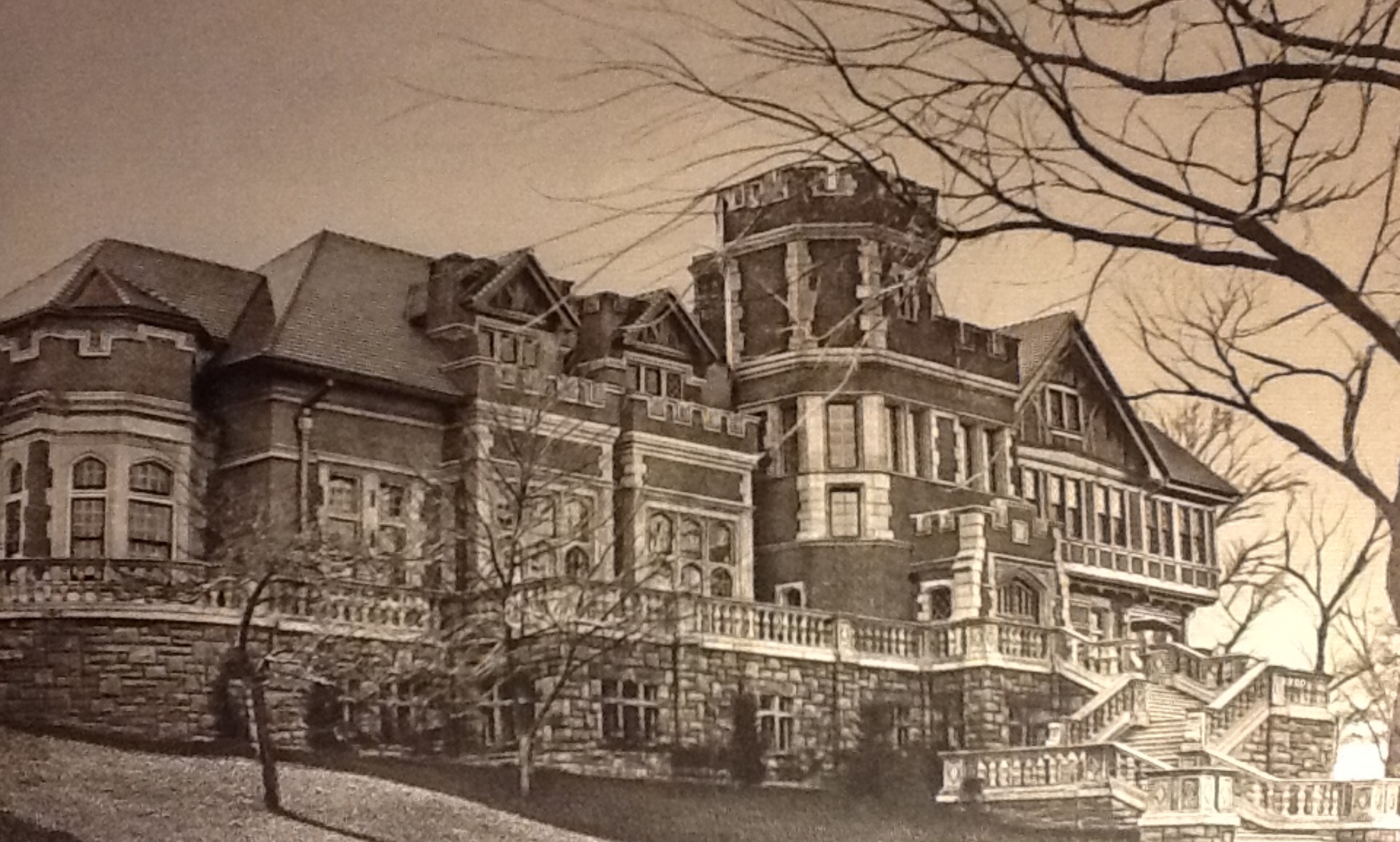 Epperson House 1922- sepia photograph of the exterior of Epperson house made of bricks and with extravagant architecture