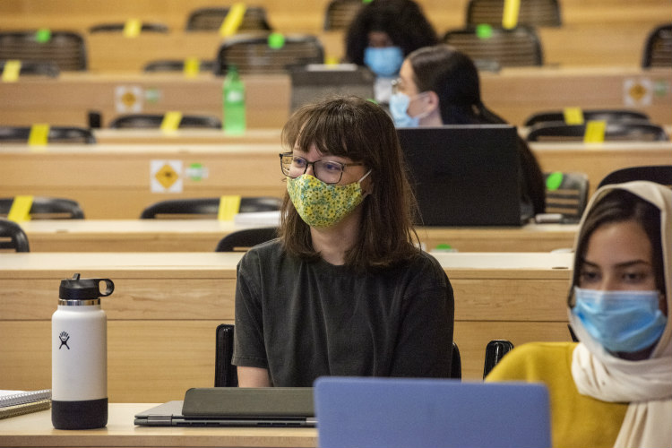 A student in class with her mask on