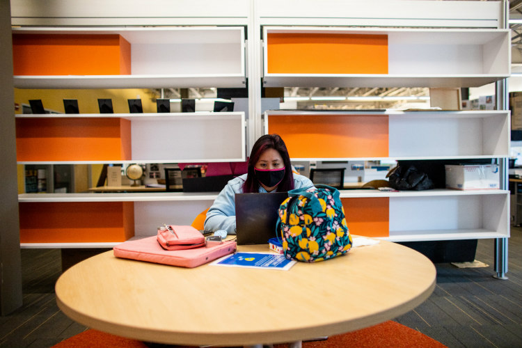 A student studies in the office of student involvement