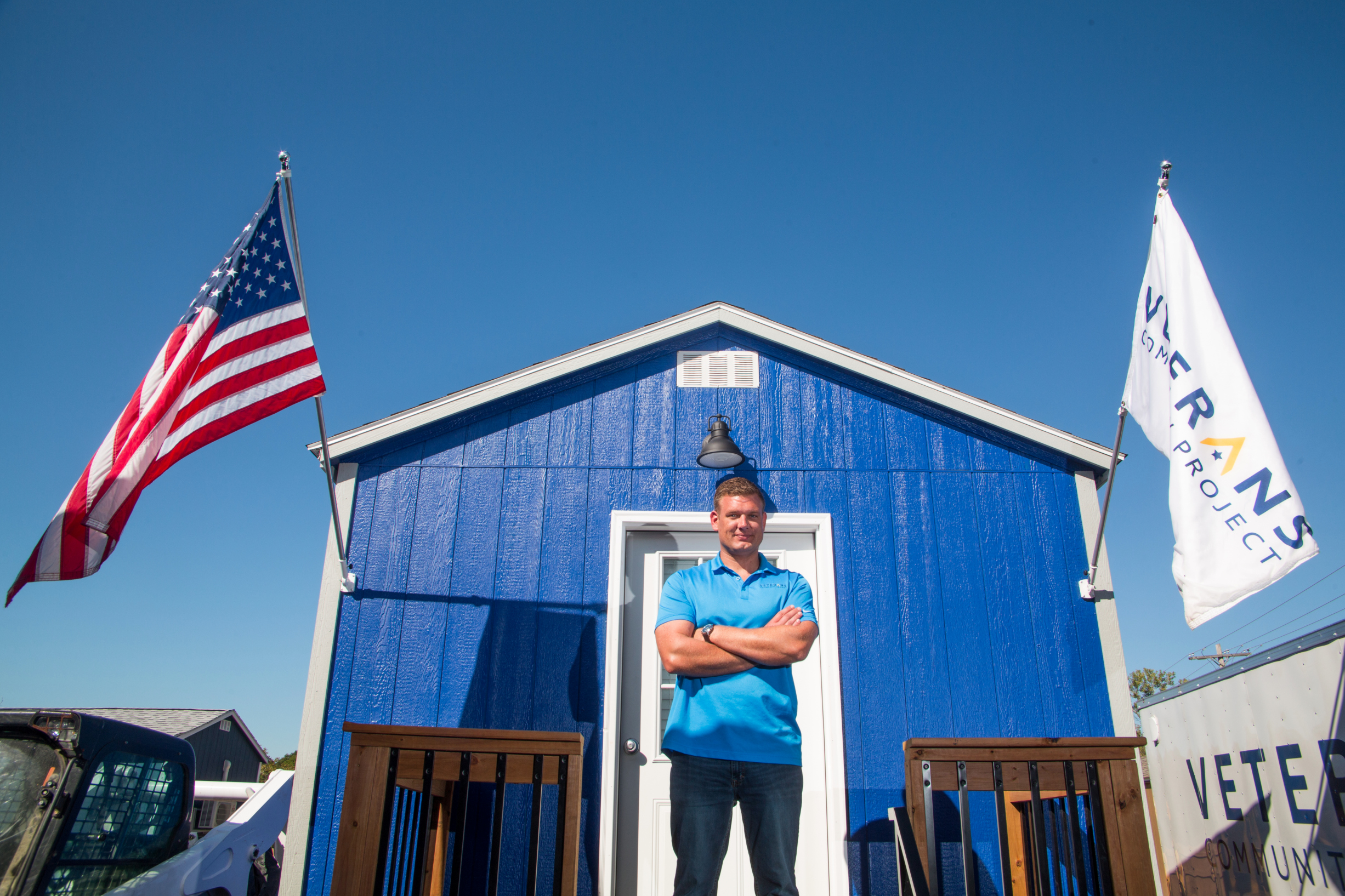 Bryan Meyer outside a tiny house at VCP