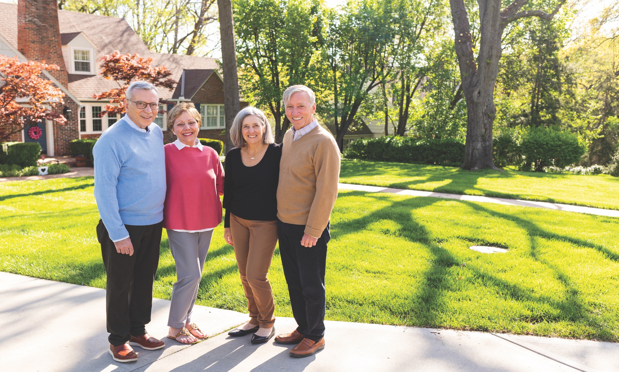 (Left to right) Jay Jackson, Mary Jackson, Kathleen Shaffer, Stan Shaffer stand outside the Jacksons' home