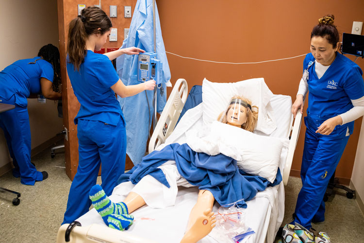 Nursing students in hospital room