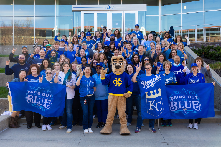 UMKC faculty and staff in Royals gear.