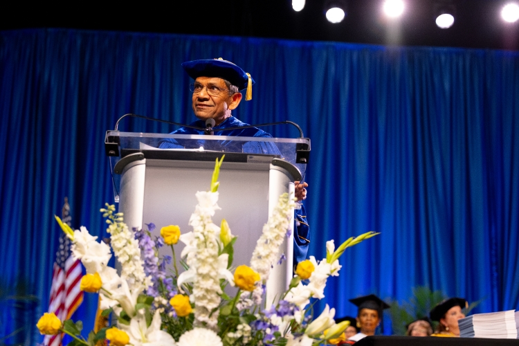 Chancellor Agrawal speaking on stage at Commencement