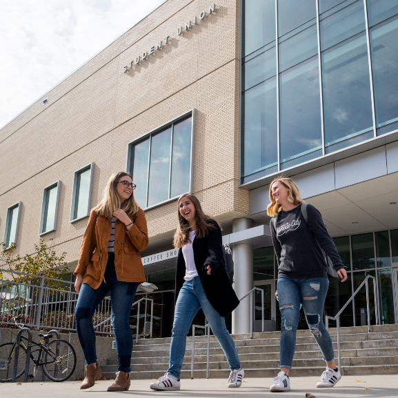 Students walking in front of the UMKC Student Union. 